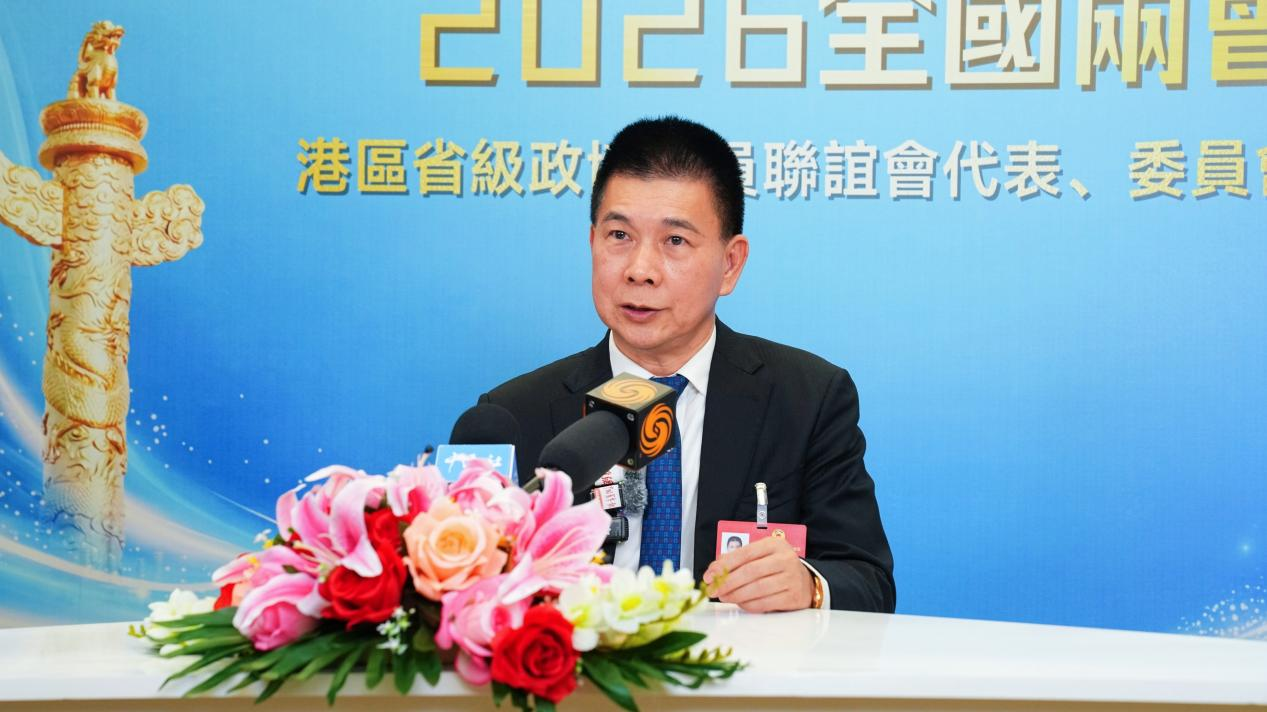 图：全国政协常委、香港友好协进会会长、香港青少年爱国主义教育基金会会长谭锦球