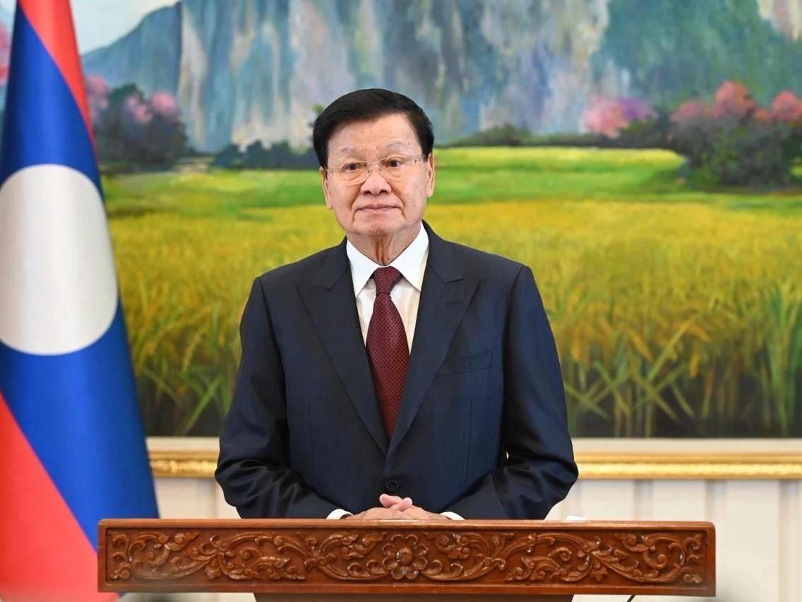 通伦连任老挝国家主席数次来华的他最爱的中国菜是猪肉饺